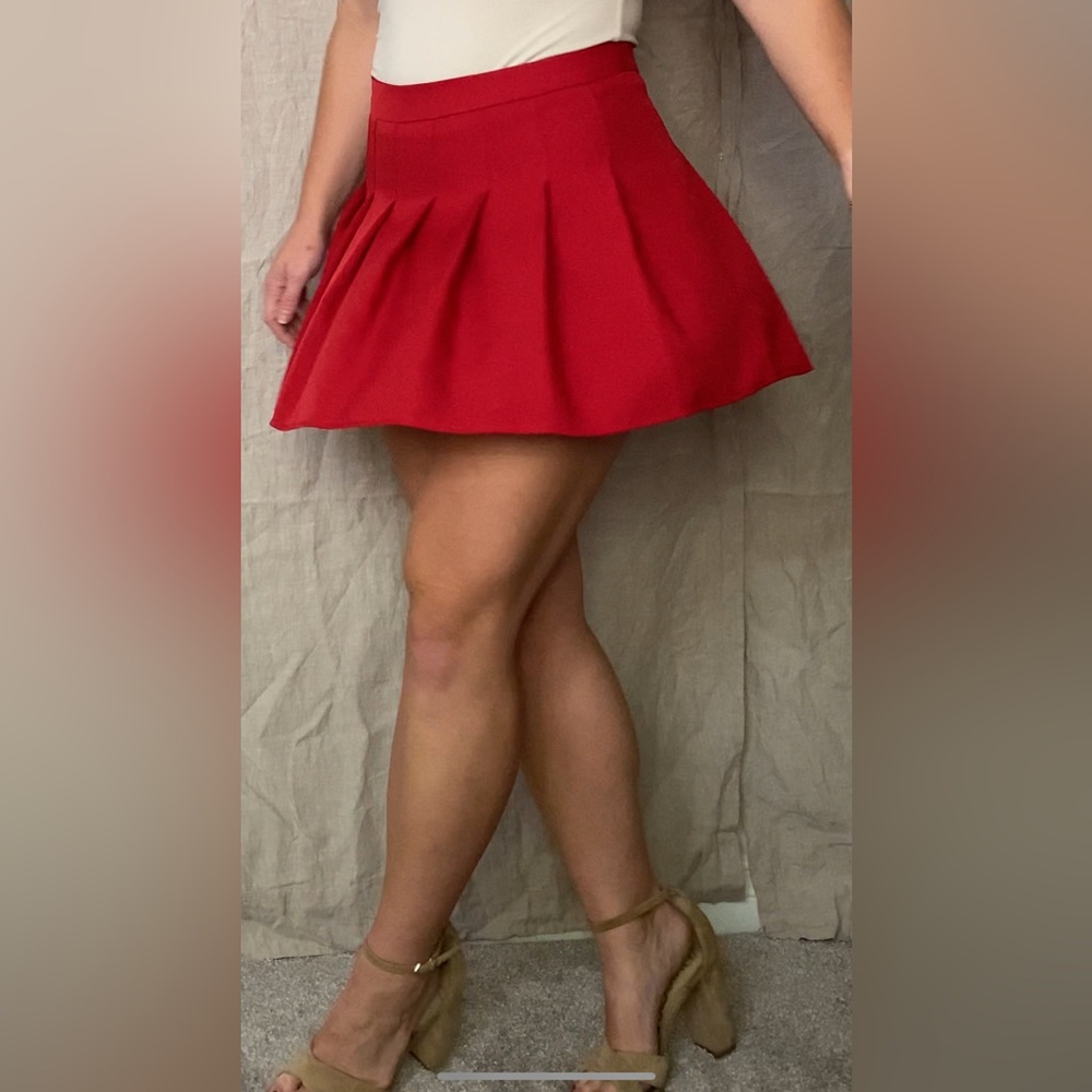 Red pleaded skort- skirt with shorts